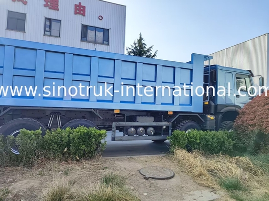 Увлекательный голубой HOWO 8×4 380HP 26.91CBM Дамп-Трак, где сила встречает точность в каждой нагрузке!