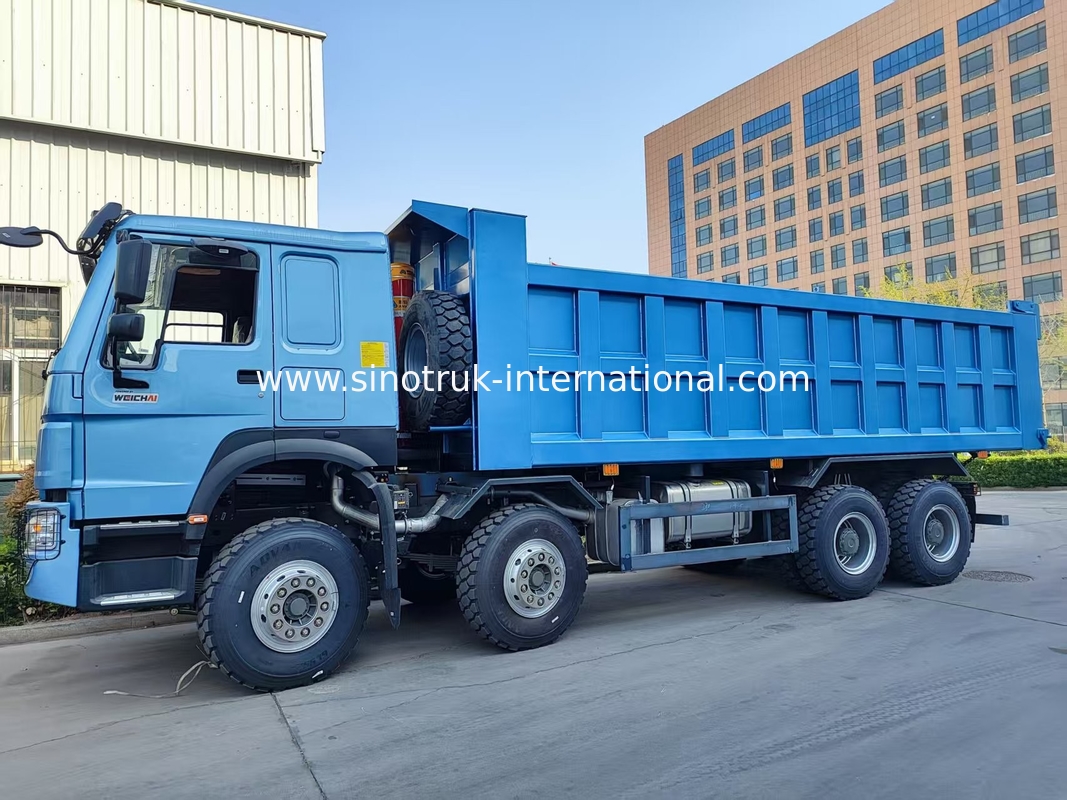 Увлекательный голубой HOWO 8×4 380HP 26.91CBM Дамп-Трак, где сила встречает точность в каждой нагрузке!