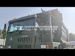 минируя самосвал